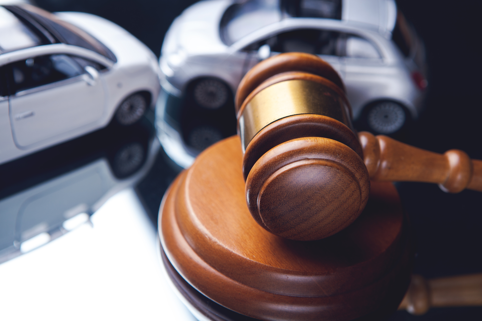 Seeking Help After Car Accidents - Model of car and gavel. Accident lawsuit or insurance, court cas